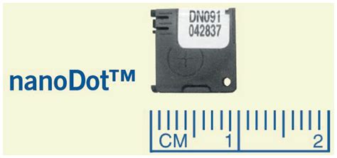 Nanodot Dosimeter Technology With Scale To Illustrate Size Download