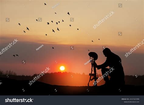 Silhouette Soldier Kneeling His Head Bowed Stock Photo 2157323789