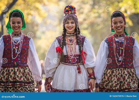 Portrait Of A Romanian Woman Wearing Traditional National Costume ...