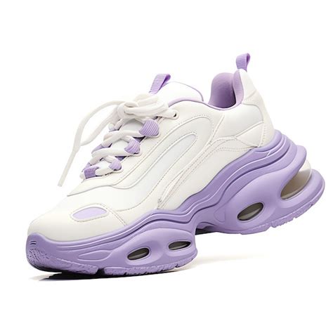 Premium Photo | A white and purple shoe