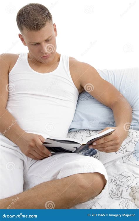 Man Lying On Bed And Reading Book Stock Image Image Of Reading Young