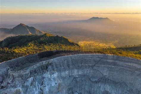 Aerial View Of Rock Cliff At Kawah Ijen Volcano With Turquoise Sulfur