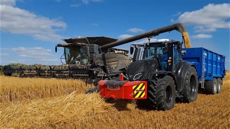 Fendt Ideal 8 Combine Valta And Massey Tractors With Stewart Trailers