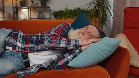 Tired One Senior Old Man Lying Down In Bed Taking A Rest At Home