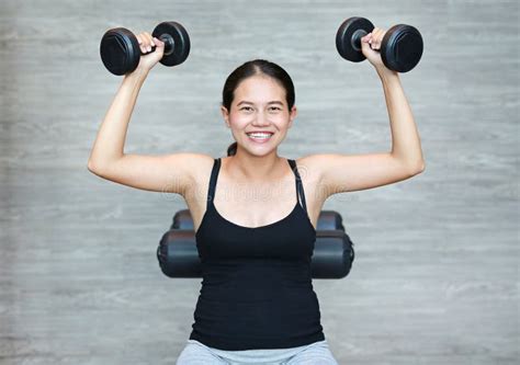 Close Up of Pregnant Woman Exercising with Weights Stock Image - Image ...