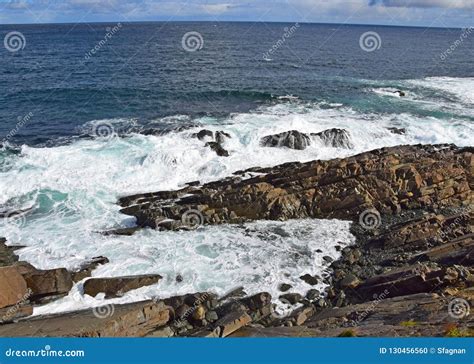 Wave Hitting A Rock In The Ocean Stock Photo Image Of Blue Tide