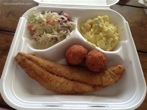 A White Tray Topped With Different Types Of Food