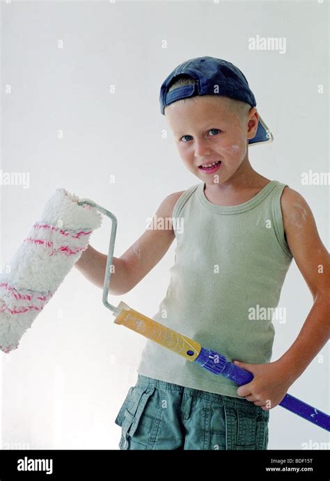 child painting wall Stock Photo - Alamy