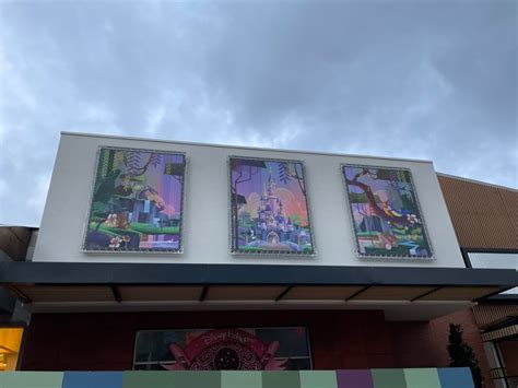 PHOTOS Sleeping Beauty Posters Installed On Disney Village Facade