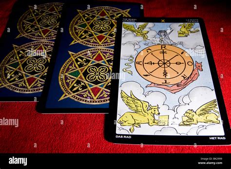 Three Tarot Cards With The Wheel Of Fortune Showing Up Stock Photo Alamy