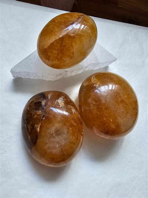 Puffy Golden Healer Palm Stone Universal Fate