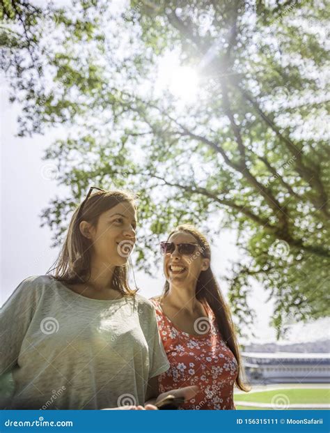 Girlfriends Walking Together Having Fun Outdoors Concept Of Modern Women Friendship Lifestyle