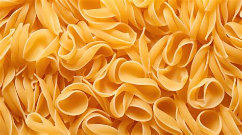 Uncooked Pasta A Close Up Look At Its Texture Background Wooden Bowl