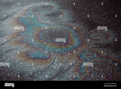 Oil Slicks On Wet Asphalt Stock Photo Alamy