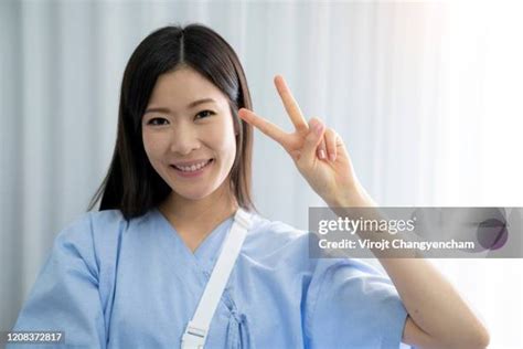 Young Asian Patient Woman Lying On Hospital Bed She Pose Vsign For Keep