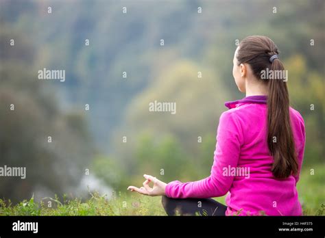 Yoga outdoors: nature meditation Stock Photo - Alamy