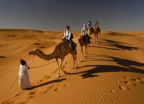 Traveling With A Local Bedouin Across The Arabian Sands Of Oman Local