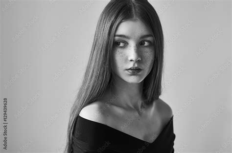 Dramatic Black And White Portrait Of A Beautiful Lonely Girl With