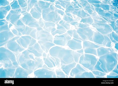 Rippled Pattern Of Clean Water In A Blue Swimming Pool For Background