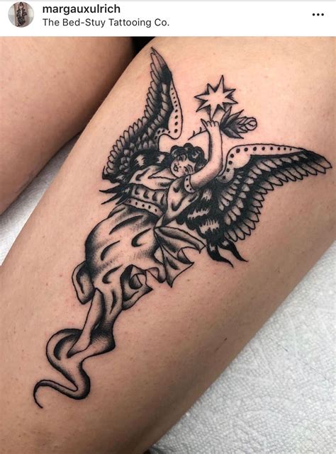 Pin On Angels And Cherubs Traditional Tattoo Cherub Tattoo Cool