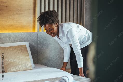 African Maid Making Bed In Hotel Room Staff Maid Making Bed African Housekeeper Making Bed