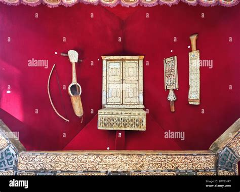 A Display Of Various Local Traditional Musical Instruments Carved Out