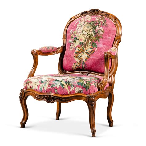 A Louis Xv Carved Walnut Chassis Armchair Circa Stamped By