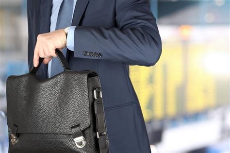 Premium Photo Businessman Checking Time On His Watch