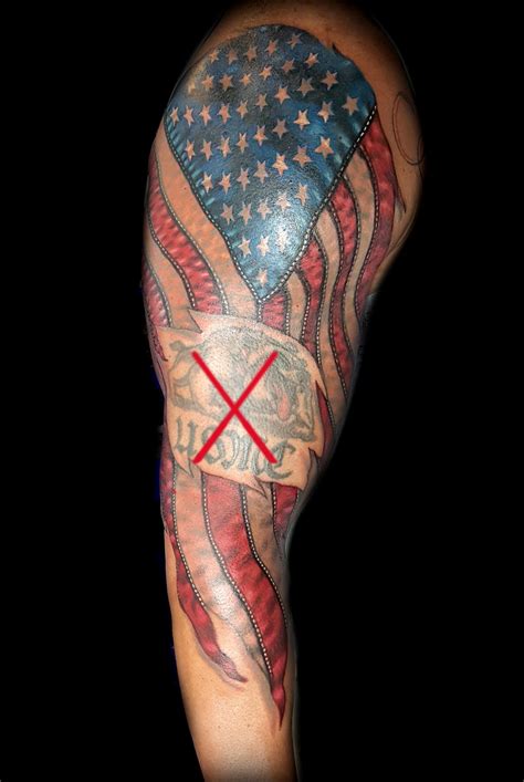 realistic flag tattoo done at Masterpiece Tattoo in San Francisco