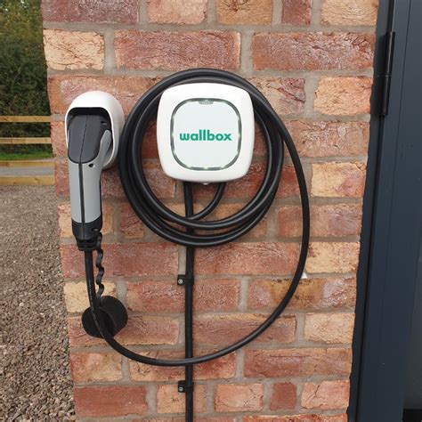 Electric Vehicle Chargers And Power Lines In The Aloise Melita