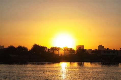 Premium Photo | Sunset cairo from the river nile bridge