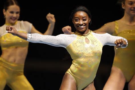 Simone Biles Backflips Past Competition Secures Spot For World