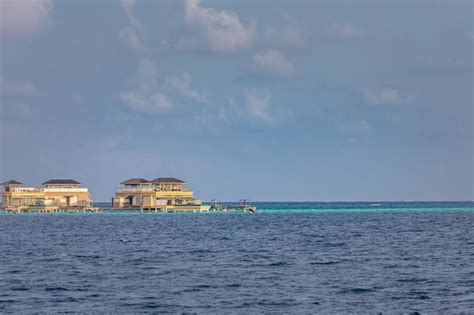 Premium Photo | Water villas resort maldives island indian ocean view ...