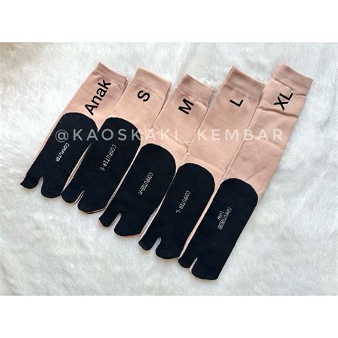 Jual SATU PASANG Kaos Kaki Jempol Nylon Cream Polos Telapak Hitam