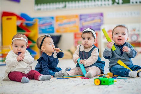 Babies Playing Together Stock Photo - Download Image Now - iStock