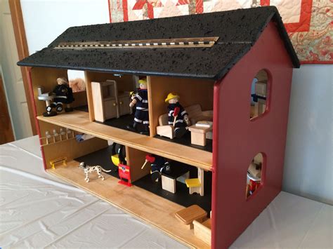 Dollhouse Up Cycled To A Firehouse Doll House For Boys Dollhouse