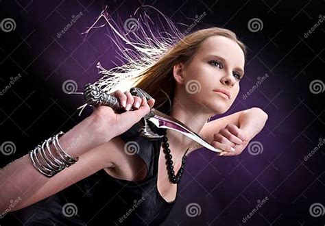 Blond Young Girl Holding Dagger Stock Image Image Of Glamour