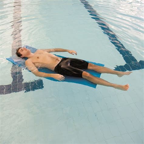 Pool exercise mat with grommets