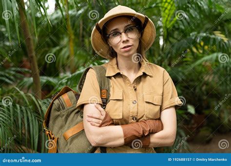 Close Up Portrait Of Woman Botanist Dressed In Safari Style In