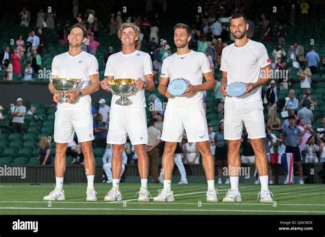 Matthew Ebden Left Of Australia And Partner Max Purcell Second Left