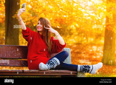 Girl Taking Self Picture Selfie With Smartphone Camera Outdoors Stock