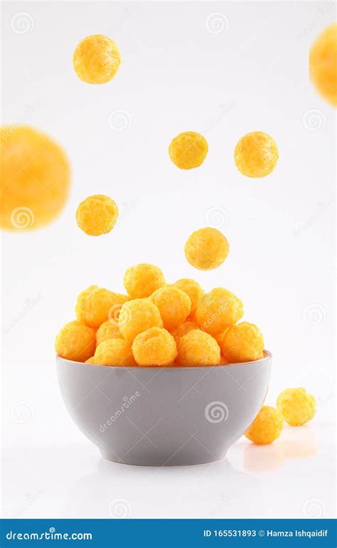 Puffed Ball Cheese Corn Chips In Gray Bowl On White Background Stock