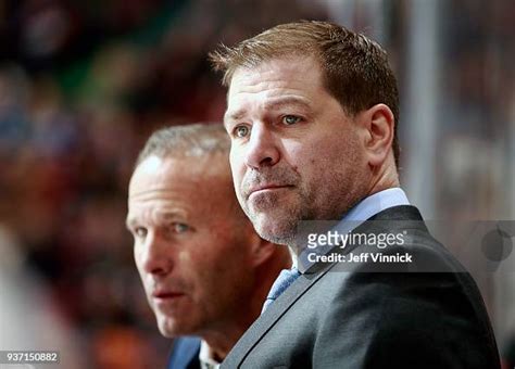 Head Coach Doug Weight Of The New York Islanders Looks On From The