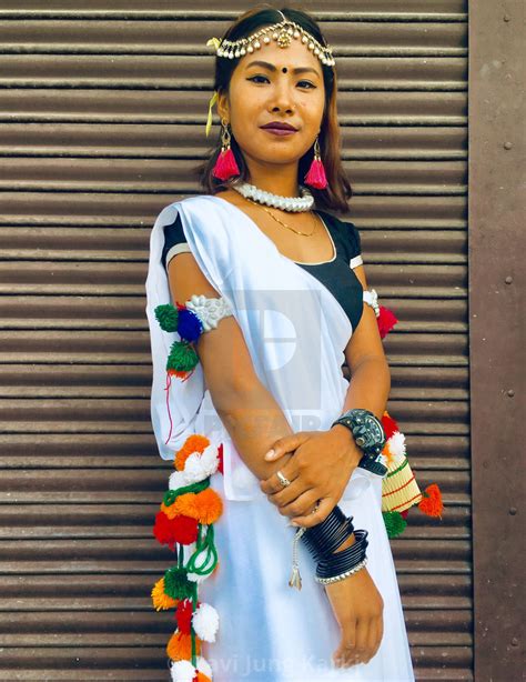 Girls Of The Tharu People In Their Traditional Dress Perform Music And ...