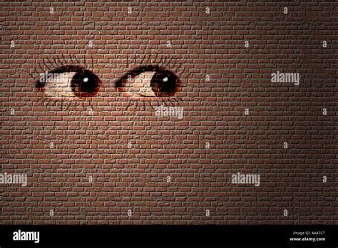 Eye graffiti on a brick wall Stock Photo - Alamy