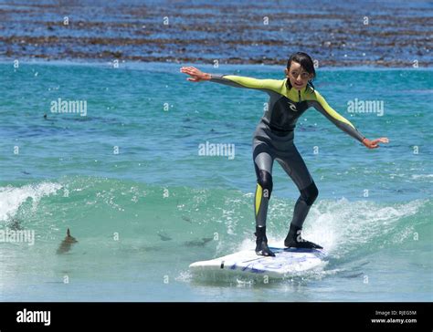 Surfing kids hi-res stock photography and images - Alamy