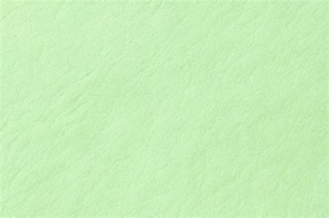 Premium Photo | Texture of old light green paper closeup