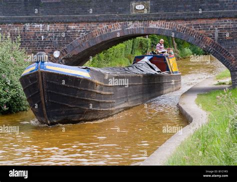 Old British Waterways Working Narrow Boat On Trent Mersey Canal