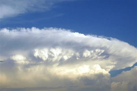 Island churns out dozens of mesmerizing, swirling clouds - The Weather ...