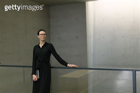 Business Woman Using Tablet Pc In Minimalist Office Interior